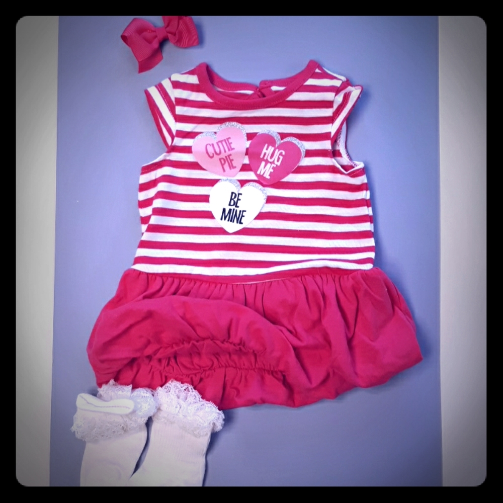 Onesie with socks and hair bow. New never worn.